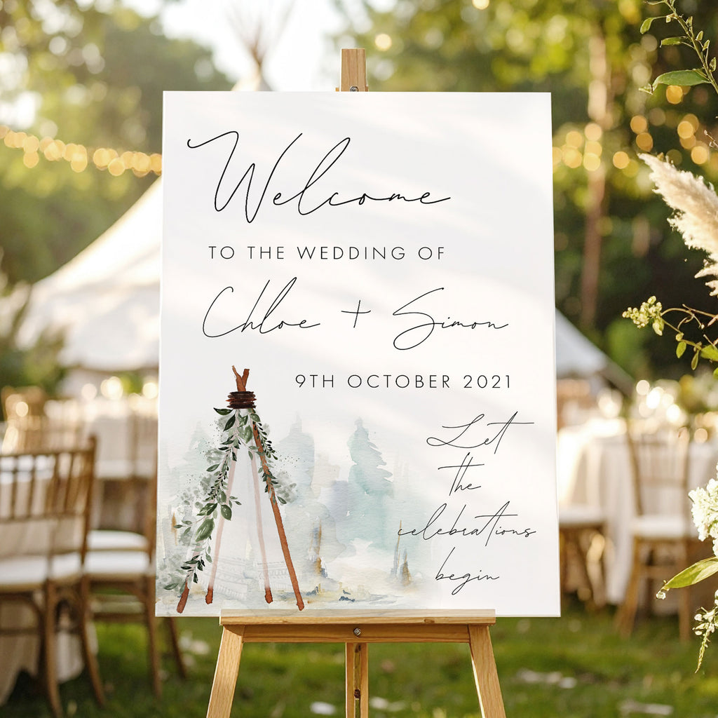 wedding welcome sign featuring a tipi in a boho style