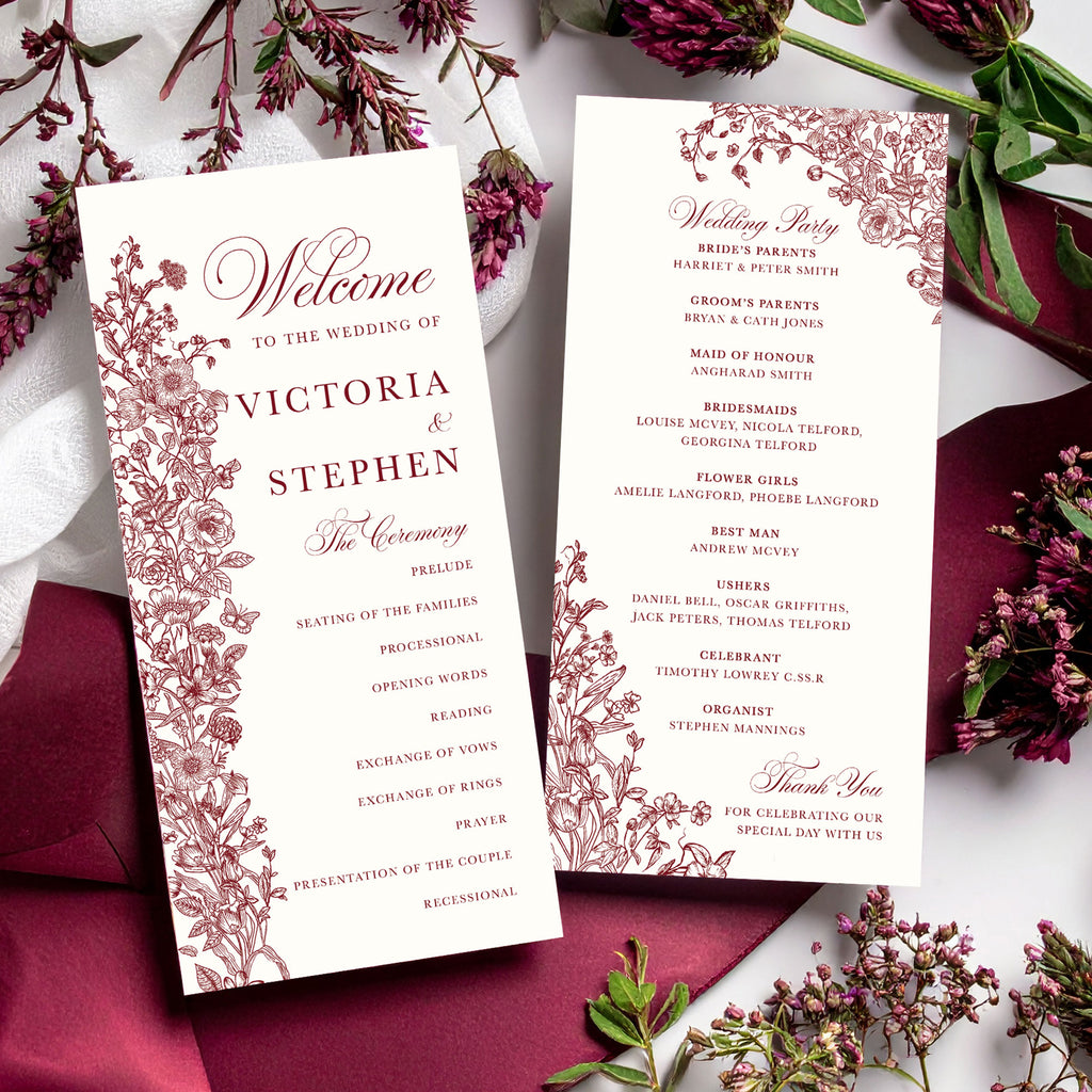 wedding programme with burgundy flowers