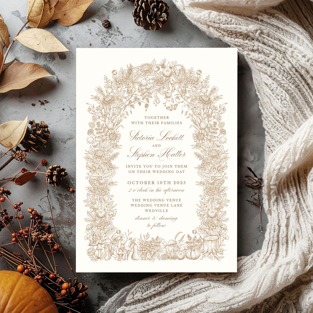 wedding invitation with a botanical border featuring rustic autumn illustrations and foliage