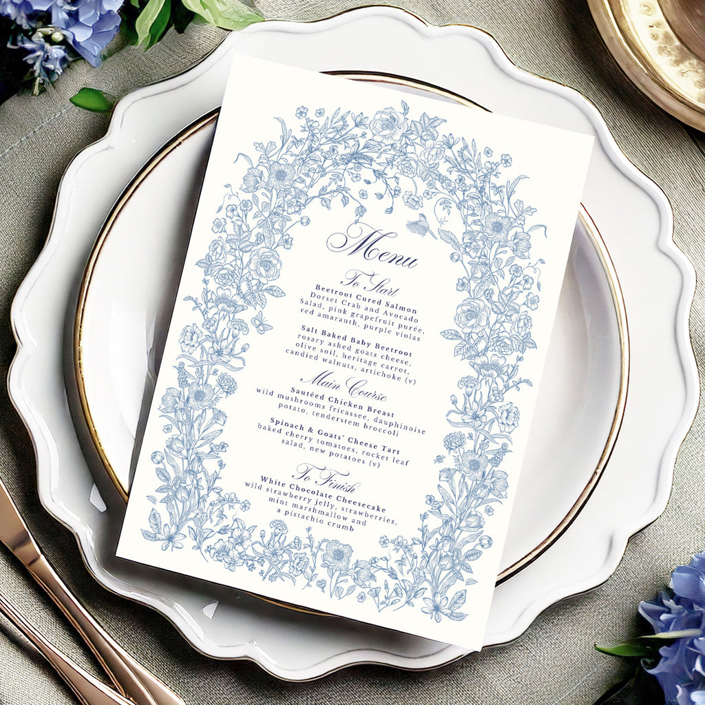 wedding menu with blue wildflowers