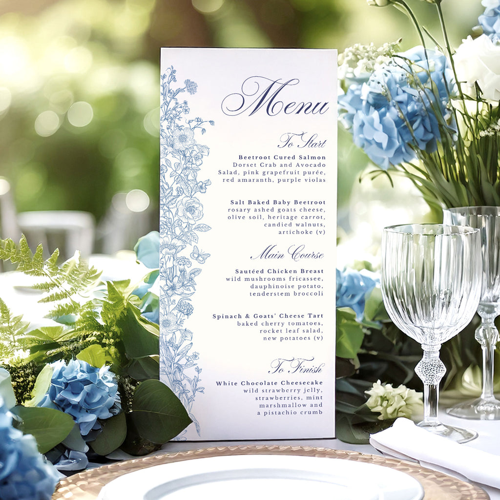 wedding menu with blue wildflowers