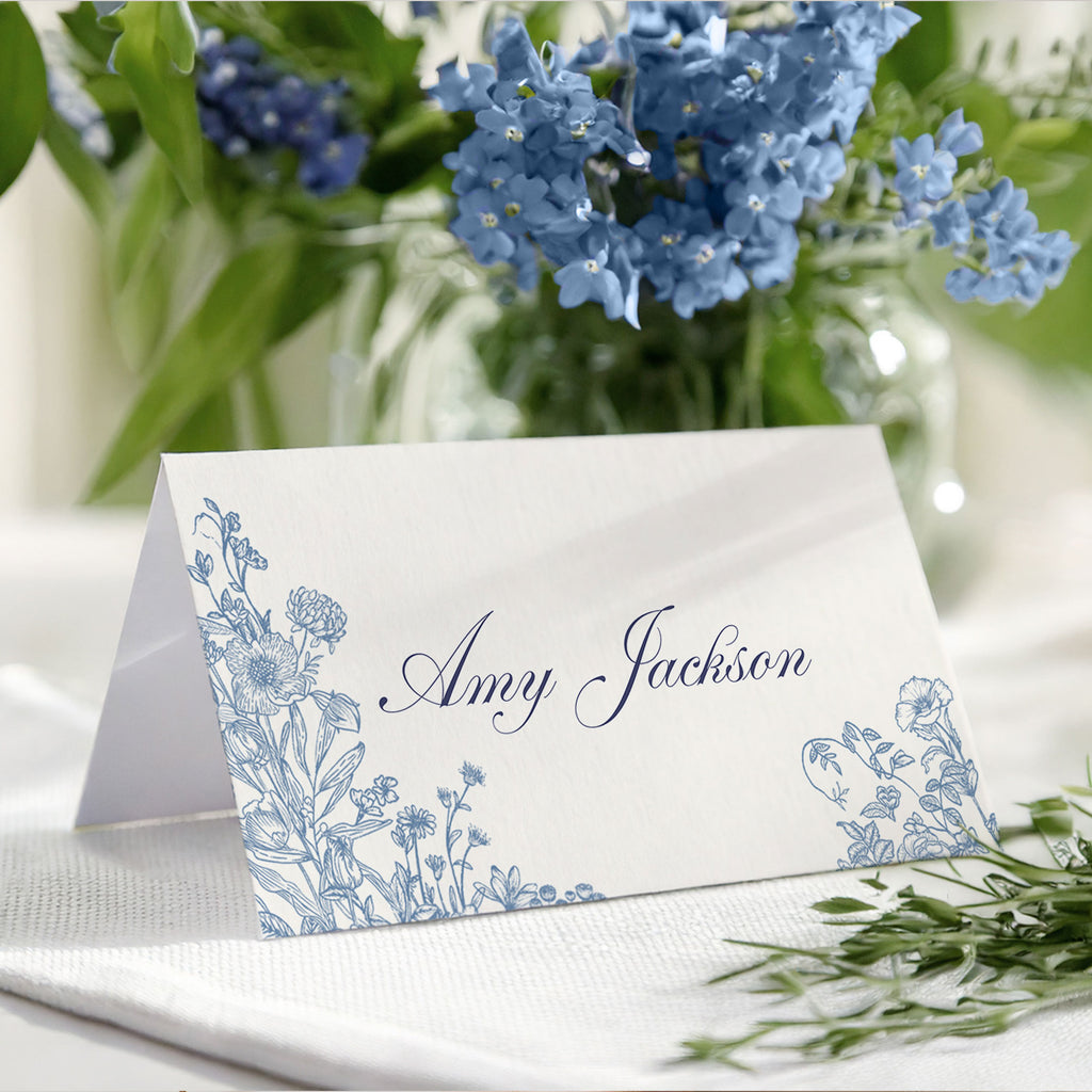 Wedding Place card with a blue floral design and text 