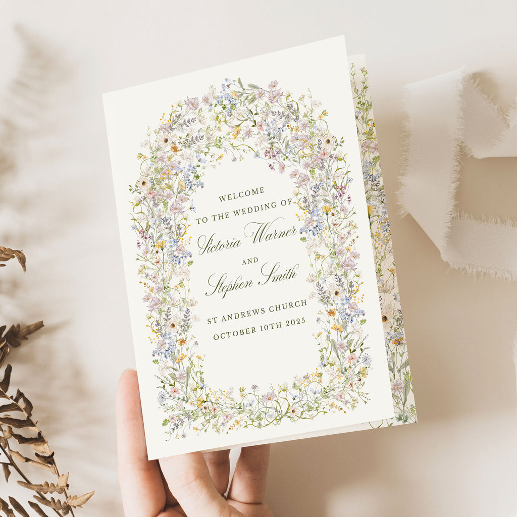 wedding order of service with pastel wildflowers and elegant green text