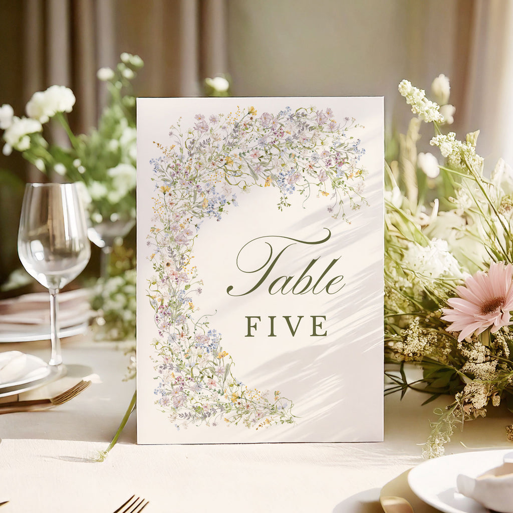 wedding table number with pastel wildflowers and elegant green text
