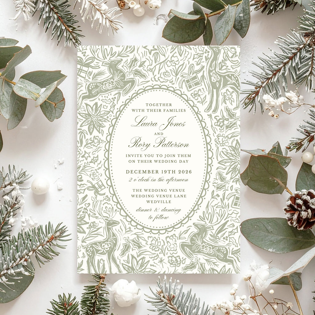 wedding invite with christmas florals and deers in sage green